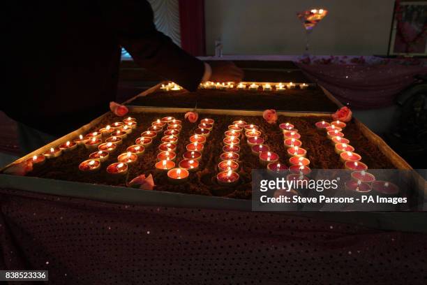 Candles are lit in memory of Anni Dewani at the Shree Kadwa Patidar Samaj in Harrow, to mark her murder one year ago whilst on honeymoon in Cape...