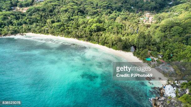 aerial view of takamaka beach -  mahe island - seychelles - pjphoto69 stock pictures, royalty-free photos & images