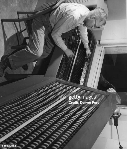 James kenna, Denver Civic theater technical director, Plays the console which activates the stage lights by pushbutton after the lighting pattern has...