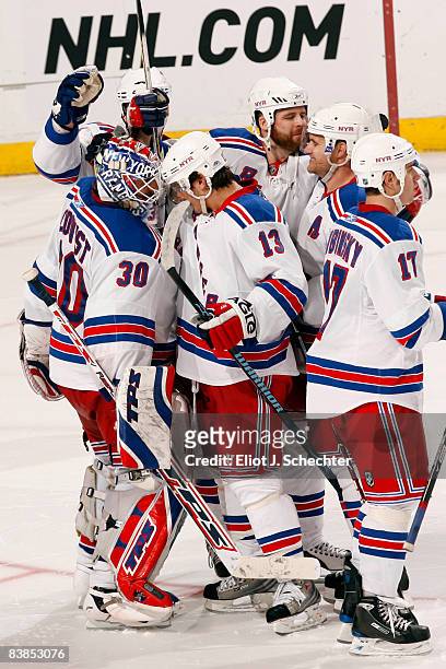 Nikolai Zherdev of the New York Rangers celebrates the win with Goaltender Henrik Lundqvist after the shootout against the Florida Panthers at the...