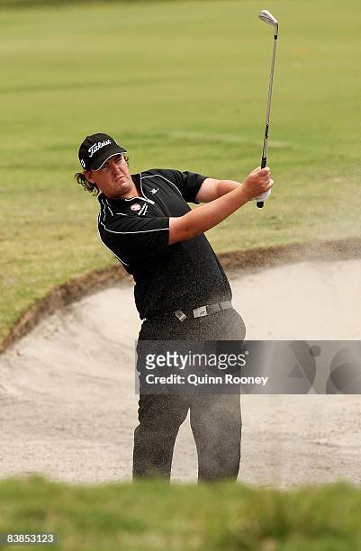 Ashley Hall of Australia plays out of the bunker on the sixth hole during the third round of the 2008 Australian Masters at Huntingdale Golf Club on...