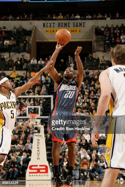 Rayond Felton of the Charlotte Bobcats shoots over T.J. Ford of the Indiana Pacers at Conseco Fieldhouse on November 28, 2008 in Indianapolis,...