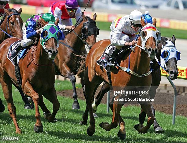 Billy Egan rides Anyways to win race 5 Mayfair Smallgoods Handicap during the Moonee Valley Racing Club Christmas at the Valley meeting held at...