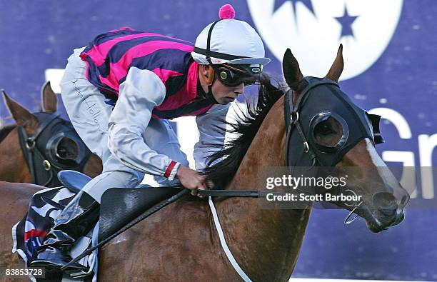 Dean Holland rides Happy Glen to win race 8 Legends After The Last Flying during the Moonee Valley Racing Club Christmas at the Valley meeting held...