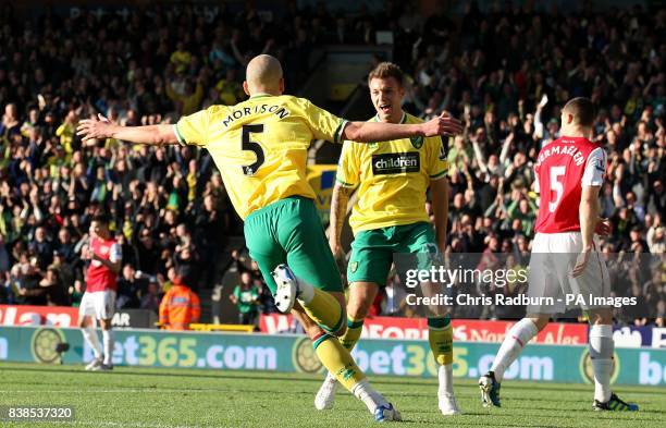 Norwich City's Steve Morison celebrateswith team mate Anthony Pilkington after he scores the opening goal of the game