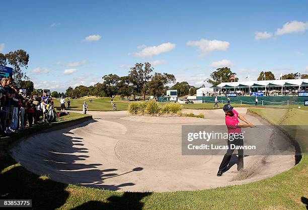 Anthony Summers of Australia hits out of the bunker on the eighteenth hole during the third round of the 2008 Australian Masters at Huntingdale Golf...