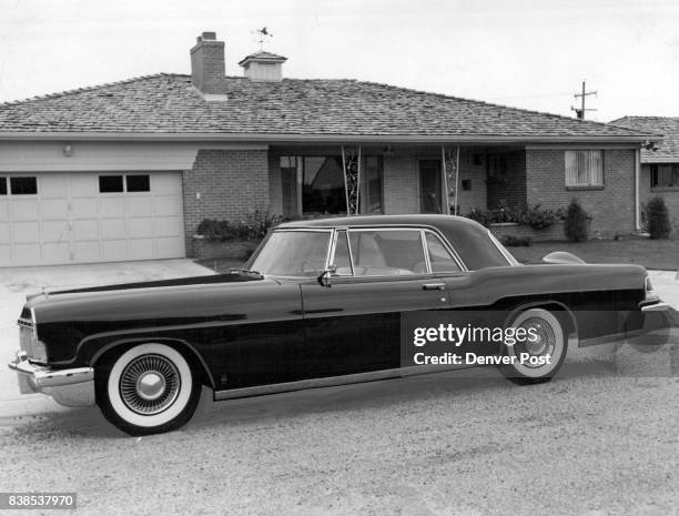 Mighty nice gift is this 1956 Lincoln Continental Mark II which Lou Bell, Lincoln-Mercury dealer, gave to his wife. The car in addition to its...