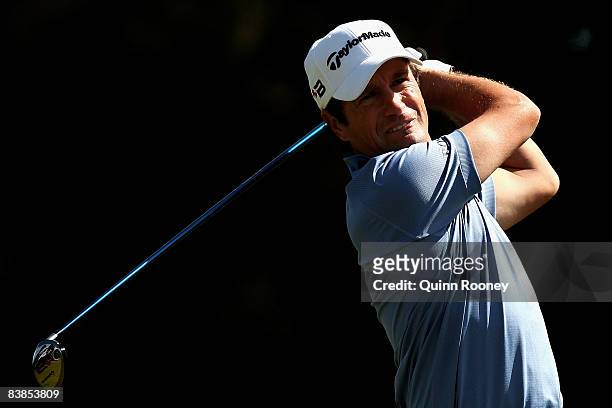 Steve Webster of England plays his second shot on the fourteenth hole during the third round of the 2008 Australian Masters at Huntingdale Golf Club...