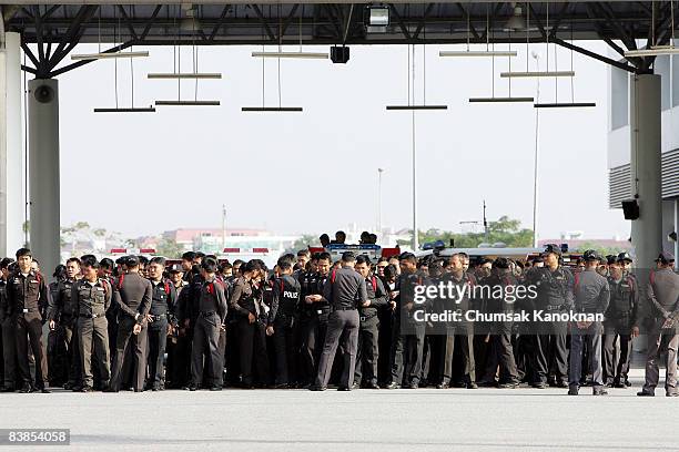 Thai Police stand near Suvarnabhumi airport on November 29, 2008 in Bangkok, Thailand. Nearly 100,000 passengers have missed flights since...