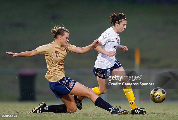 Emily Van Egmond of the Jets contests the ball with Trudy Camilleri of the Mariners during the round six W-League match between the Central Coast...