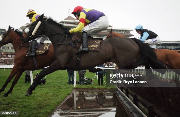 Tom Scudamore riding Madison du Berlais in action during The Hennessy Gold Cup Steeple Chase at Newbury Races on November 29, 2008 in Newbury,...
