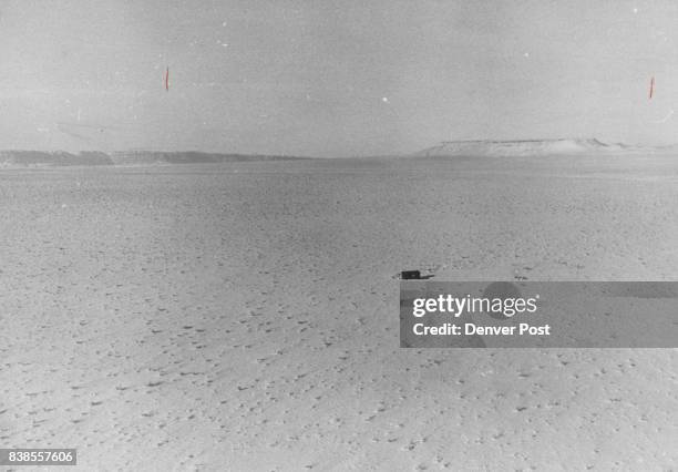 Painted Desert Wears A Coat of White - Snow Navajo Indians have lived in this Arizona area for centuries. That's an Indian house in the center...