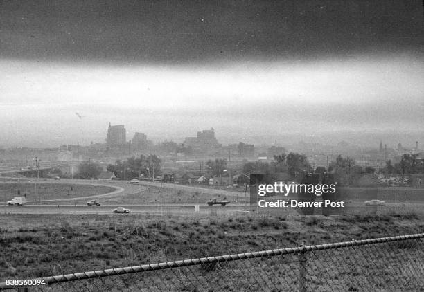 Smog Forms Eye-Smarting Blanket Over Denver Clouds that hung over Denver Friday morning held down a bank of annoying smog. This view of the downtown...