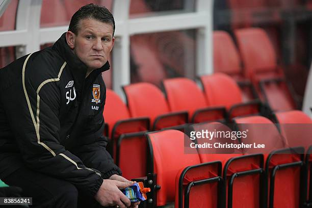Substitute Dean Windass of Hull City sits on the bench during the Barclays Premier League match between Stoke City and Hull City at The Britannia...