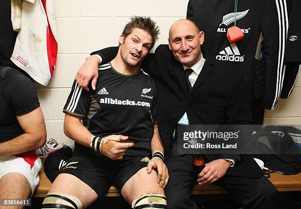 New Zealand Rugby Union chairman Jock Hobbs and Richie McCaw pose in the changing rooms after victory in the Investec Challenge match between England...