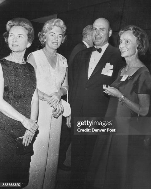 Yale Alumni Get Together Guests arriving at Brown Palace Hotel for the Yale Alumni dinner dance were from left, Mrs. John Hall of New Haven, Conn.;...