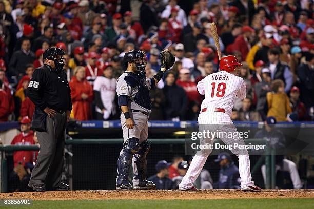 Greg Dobbs of the Philadelphia Phillies is intentionally walked in the bottom of the ninth inning by catcher Dioner Navarro of the Tampa Bay Rays...