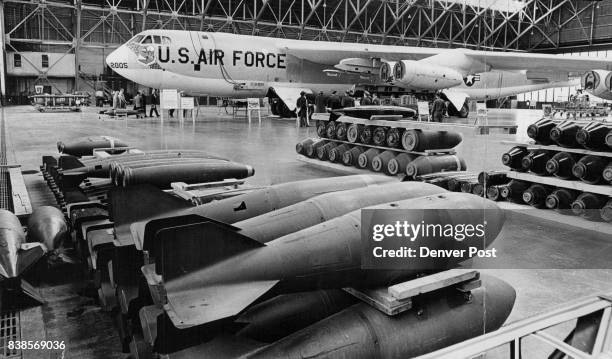 Mockup of B52 Jet Bomber is used in Lowry Training. In foreground are 750-pound bombs. Others are 500-pounders. Credit: Denver Post