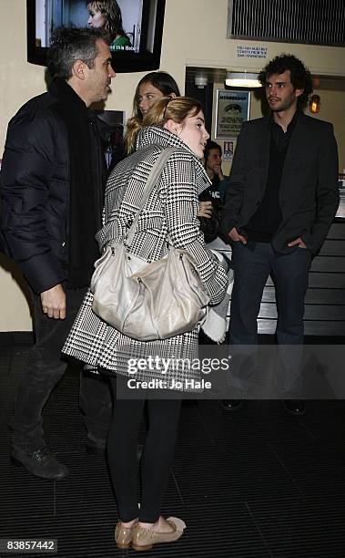 Alfonso Cuaron, Emma Watson and Jonas Curaron arrive at the UK premiere of Ano Una at Curzon Renoir Cinema on November 29, 2008 in London, England.