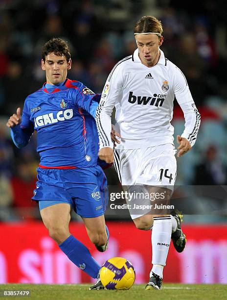 Jose Maria Gutierrez of Real Madrid duels for the ball with Jaime Gavilan Martinez of Getafe during the La Liga match between Getafe and Real Madrid...