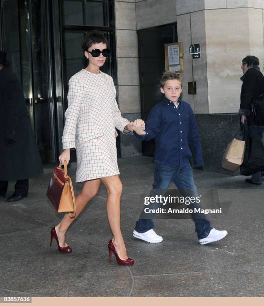 Victoria Beckham walks with son Brooklyn Beckham in front of the Plaza Hotel November 29, 2008 in New York City.