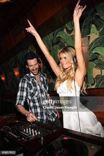 Ross 1 and model Marisa Miller attend an Evening Celebrating Vans by Marisa Miller at The Cabanas at the Maritime Hotel on July 16, 2008 in New York...