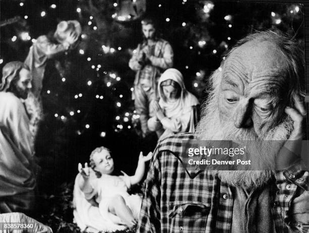 Christmas Contemplation Frederick Schwab contemplates the nativity scene at Holy Ghost Roman Catholic Church, 19th and California streets. Schwab,...