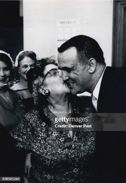 Mother's Prerogative Municipal Judge Sherman Finesilver's mother, Mrs. Beck Finesilver, exercises a mother's prerogative as she kisses her son after...
