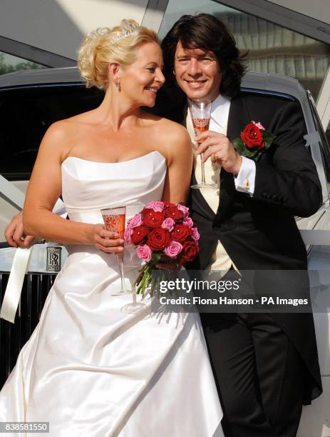 Designer and presenter Laurence Llewelyn-Bowen and wife Jackie, a wedding planner, open the National wedding Show at Earls Court 2, London today.