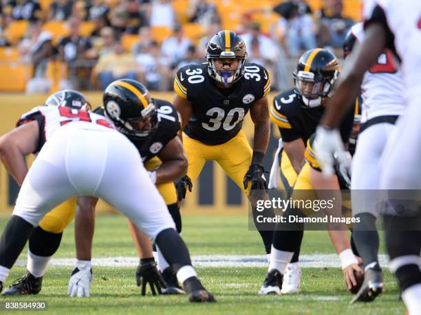 Running back James Conner of the Pittsburgh Steelers awaits the snap from his position in the third quarter of a preseason game on August 20, 2017...
