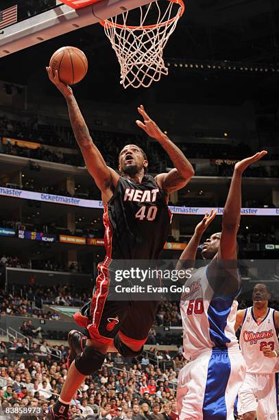 Udonis Haslem of the Miami Heat goes up for a shot against Zach Randolph of the Los Angeles Clippers at Staples Center on November 29, 2008 in Los...