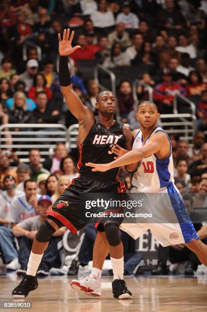 Dwyane Wade of the Miami Heat calls for the ball against Eric Gordon of the Los Angeles Clippers at Staples Center on November 29, 2008 in Los...