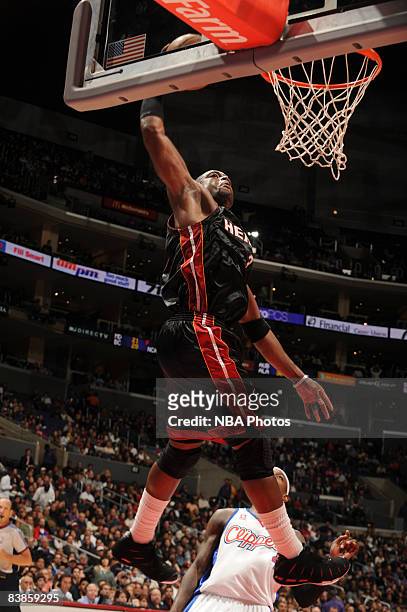 Dwyane Wade of the Miami Heat rises for an uncontested dunk against the Los Angeles Clippers at Staples Center on November 29, 2008 in Los Angeles,...