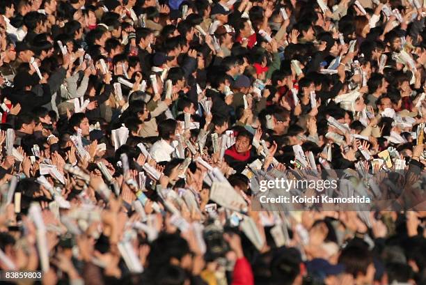 Japanese horse race fans watch the Japan Cup 2008 at Tokyo Racecourse on November 30, 2008 in Tokyo, Japan.