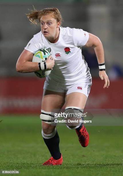 Harriet Millar-Mills of England runs with the ball during the Women's Rugby World Cup 2017 semi final match between England and France at the...