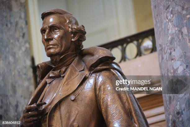 Statue of Confederate States president Jefferson Davis is seen in Statuary Hall of the US Capitol in Washington, DC on August 24, 2017. - With moves...