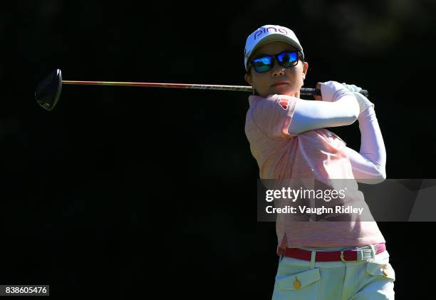 Ayako Uehara of Japan watches her shot on the 4th tee during round one of the Canadian Pacific Women's Open at the Ottawa Hunt & Golf Club on August...