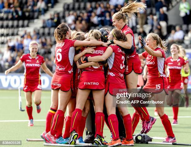 Belgium's players celebrate after winning the Women's Rabo EuroHockey Championships field hockey match between Germany and Belgium in Amstelveen on...