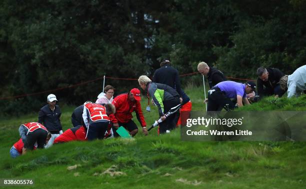 Players look for a ball on the 18th hole during day one of Made in Denmark at Himmerland Golf & Spa Resort on August 24, 2017 in Aalborg, Denmark.