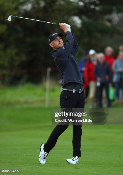 Jeff Winther of Denmark hits his second shot on the 18th hole during day one of Made in Denmark at Himmerland Golf & Spa Resort on August 24, 2017 in...