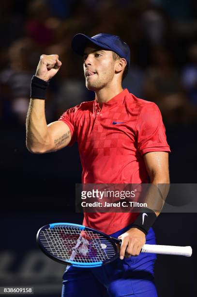 Borna Coric of Croatia reacts after winning his match against John Isner during the fifth day of the Winston-Salem Open at Wake Forest University on...