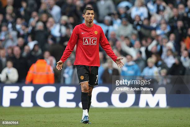 Cristiano Ronaldo of Manchester United is sent off by referee Howard Webb during the Barclays Premier League match between Manchester City and...