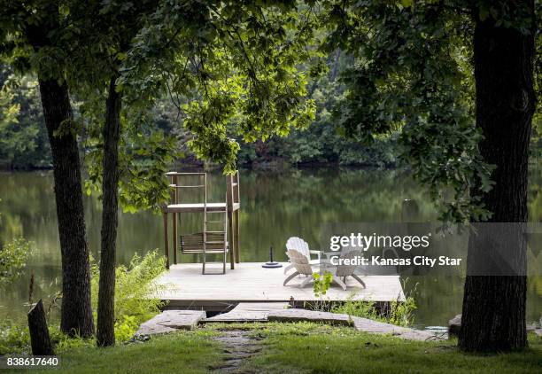 In addition to an in-ground swimming pool, the home's nine-acre property has a 10-acre, spring-fed lake for fishing and boating.