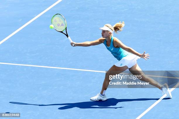 Daria Gavrilova of Australia returns a shot to Kirsten Flipkens of Belgium during Day 7 of the Connecticut Open at Connecticut Tennis Center at Yale...