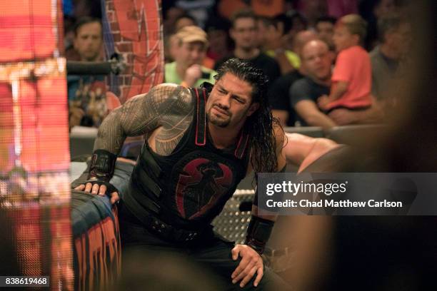 Professional Wrestling: WWE SummerSlam: Roman Reigns out of ring during injury vs Brock Lesnar during match at Barclays Center. Brooklyn, NY...