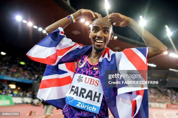 Great Britain's Mo Farah celebrates after winning the men's 5000m event during the IAAF Diamond League Athletics Weltklasse meeting in Zurich on...