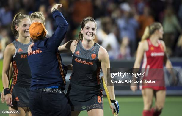 Marloes Keetels of The Netherlands reacts as she celebrates with teammates after victory in the women's EuroHockey Championships match between the...