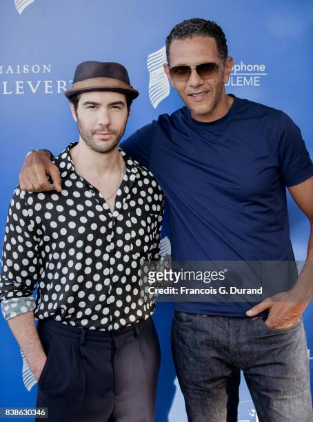 Tahar Rahim and Roschdy Zem attend the 10th Angouleme French-Speaking Film Festival on August 24, 2017 in Angouleme, France.