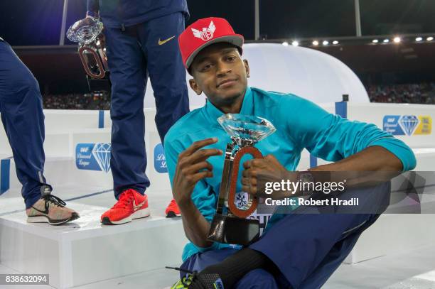 Mutaz Essa Barshim of Qatar celebrates with the diamond trophy during the Diamond League Athletics meeting 'Weltklasse' on August 24, 2017 at the...
