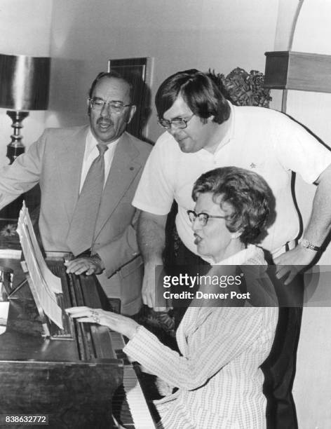 Testing harmony of songs for choruses are, from left, directors Clint Gaston, Michael Thomas and Miss Helene Hesp. Credit: Denver Post
